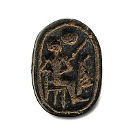 Egyptian Black Stone Scarab with Seated Figure