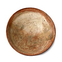 Byzantine Terracotta Sgrafitto Dish with a Falcon Among Leafy Branches