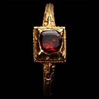 Renaissance Gold Ring with a Table-Cut Garnet
