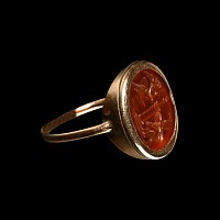 Roman Carnelian Gemstone of Two Erotes Flanking a Column in a Nineteenth-Century Gold Ring