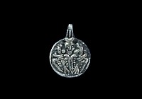 Viking Silver-Gilt Pendant with Odin Gripping Two Ravens