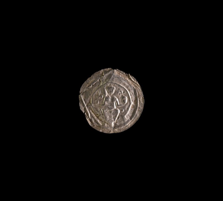 Medieval Silver Bracteate with Seated Figure