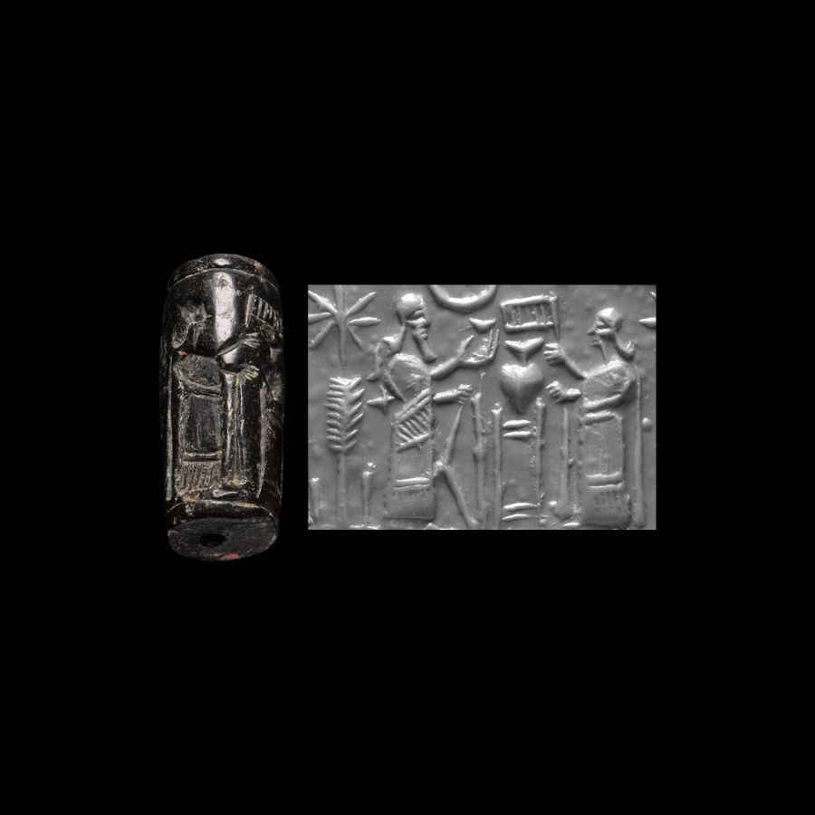 Neo-Assyrian Black Jasper Cylinder Seal with Cultic Banquet Scene