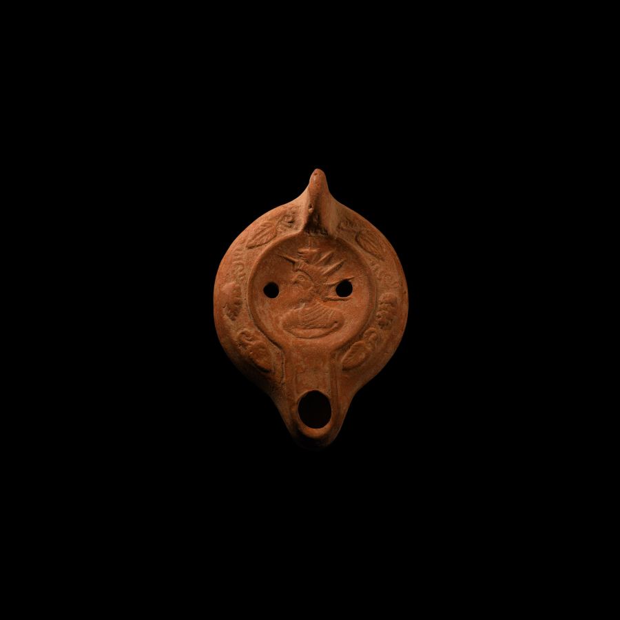 Roman Redware Lamp with Radiate Head of Serapis