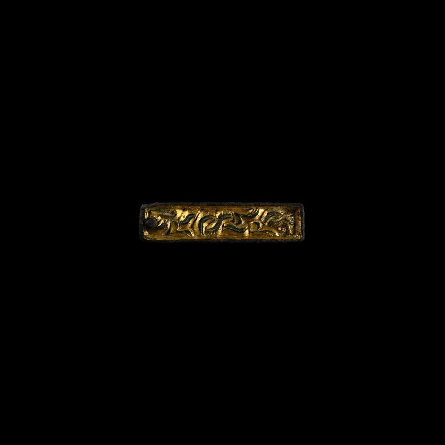 Anglo-Saxon Gilt Chip-Carved Beast Mount