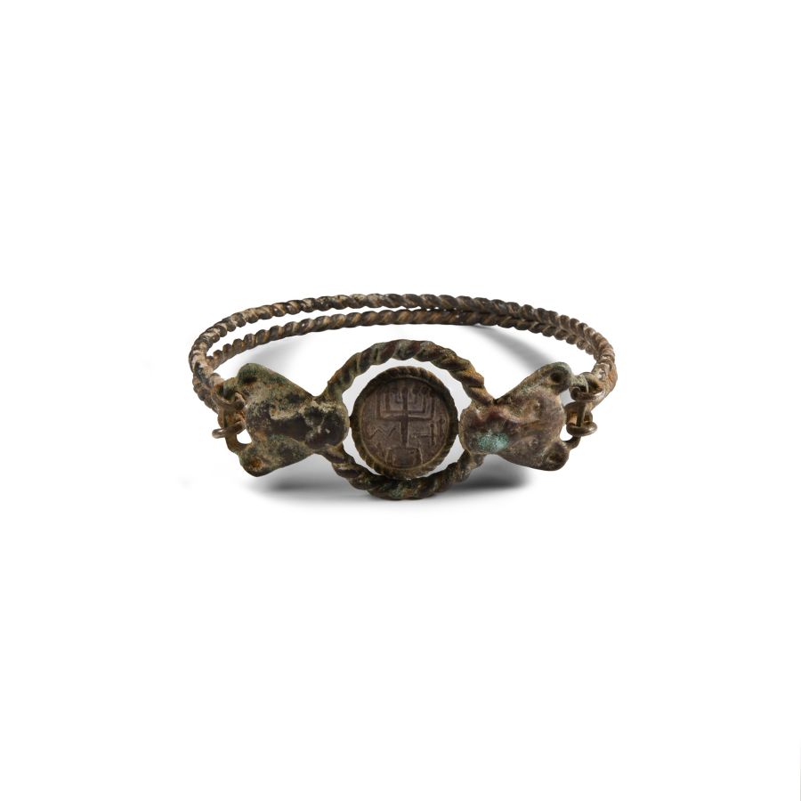 Western Asiatic Silver Bracelet with Lion Head Terminals Holding a Menorah