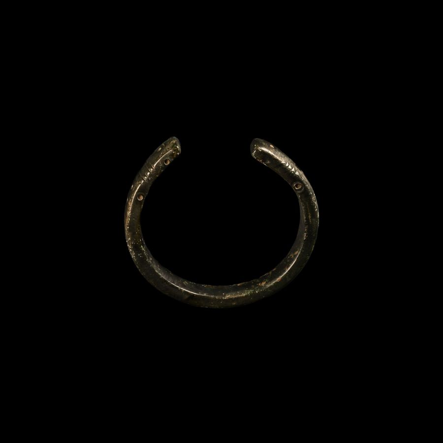 Bronze Age Punch Decorated Zoomorphic Snake Bracelet