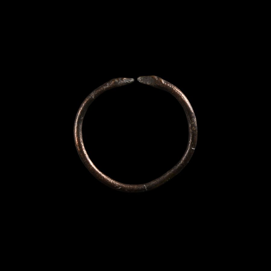 Western Asiatic Copper Bracelet with Animal Terminals