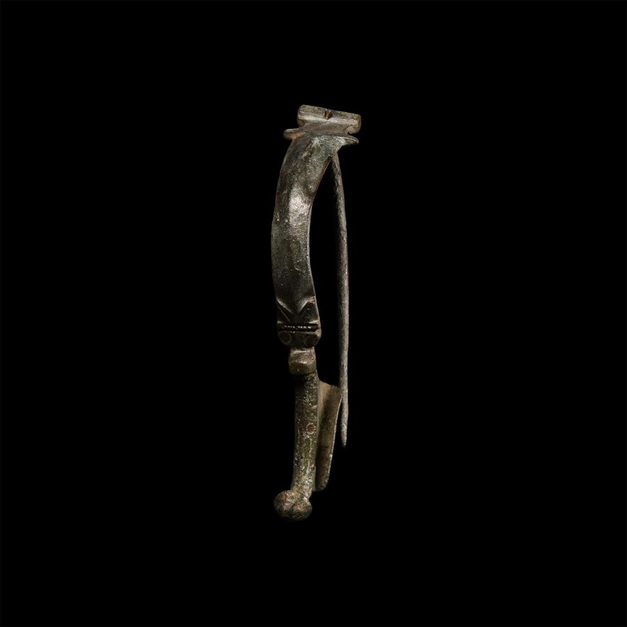Large Roman Aucissa Bow Brooch with Wolf's Face