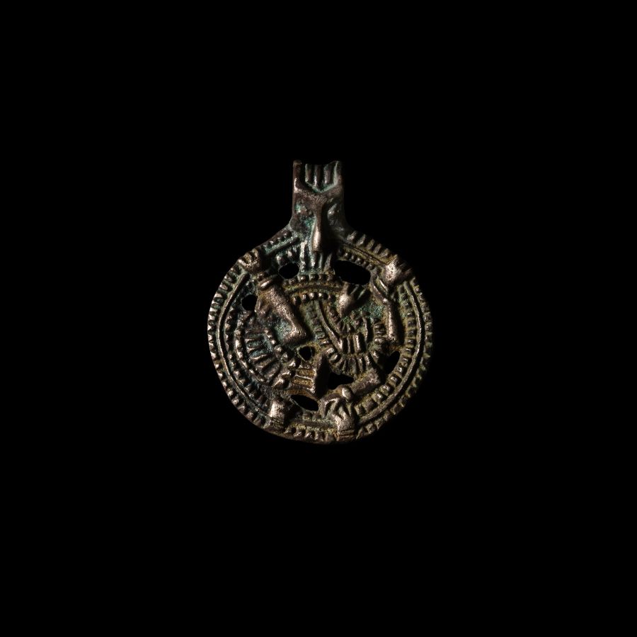 Viking Age Silver Gripping Beast Pendant