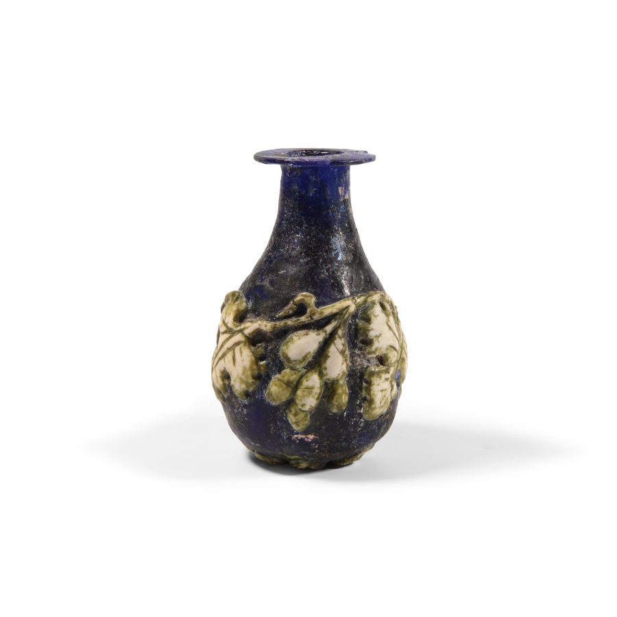 Roman Blue Glass Vessel with Vine Leaf Design