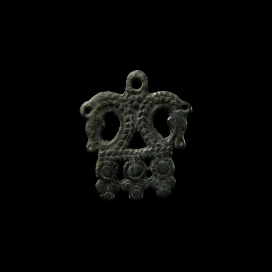 Viking Age Bronze Pendant with Opposed Horse Heads
