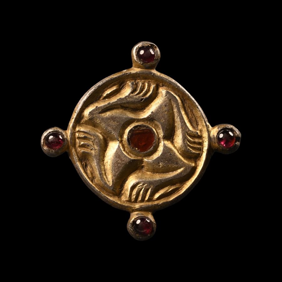 Merovingian Silver-Gilt Leg Whorl Brooch with Garnets