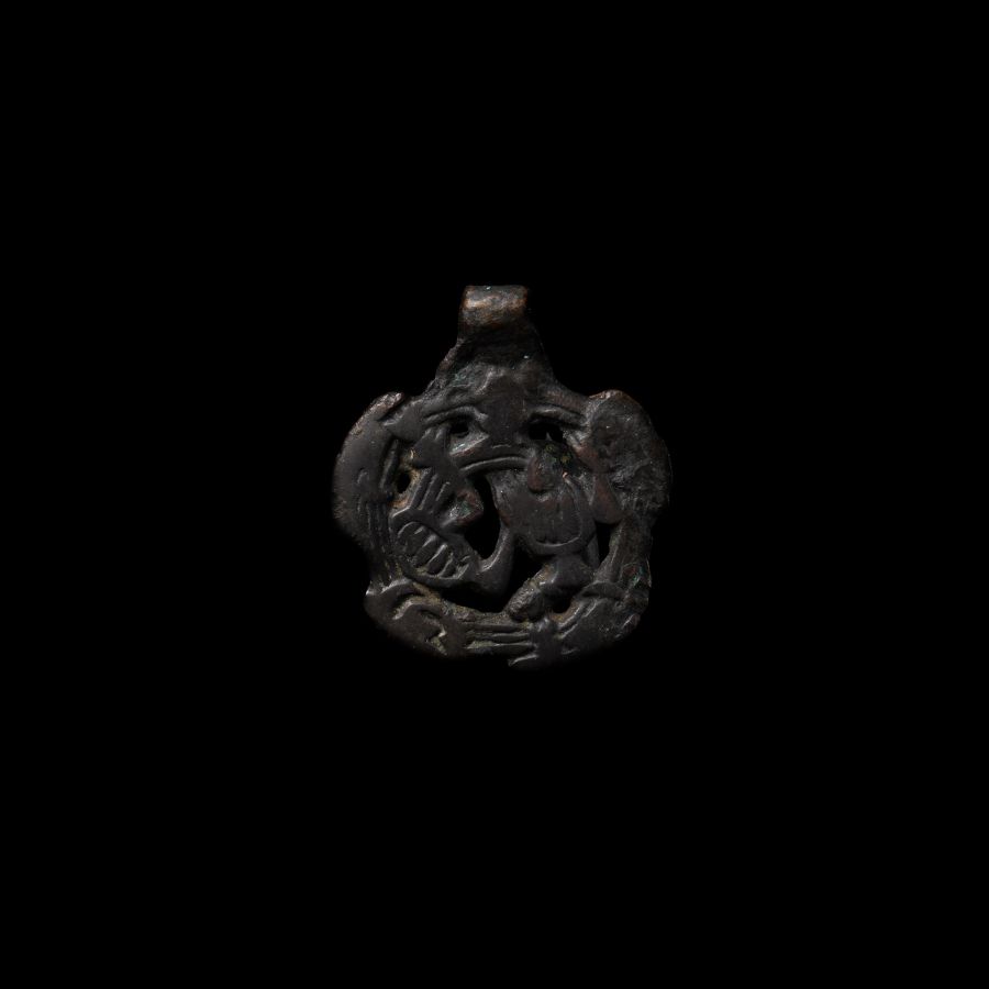 Viking Age Bronze Contorted Gripping Beast Pendant
