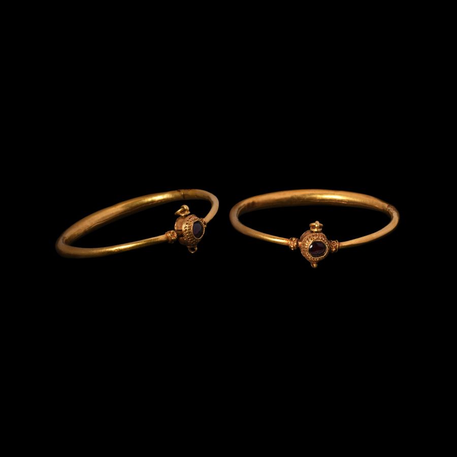 Western Asiatic Gold Hinged Bracelet with Garnet