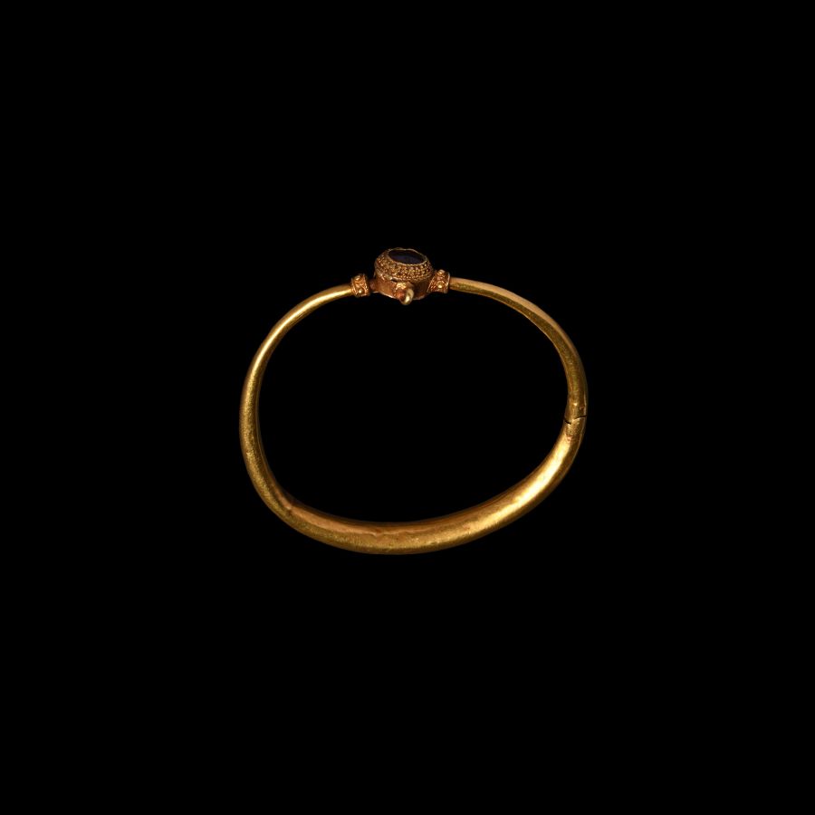 Western Asiatic Gold Hinged Bracelet with Garnet
