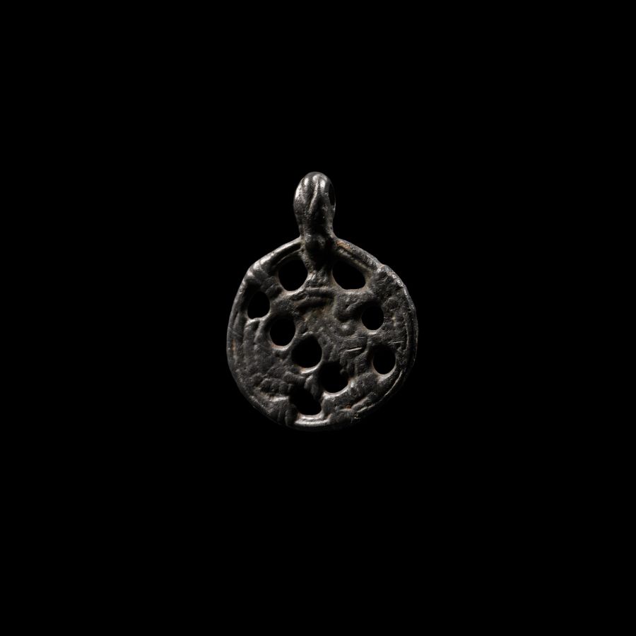 Viking Age Bronze Gripping Beast Pendant