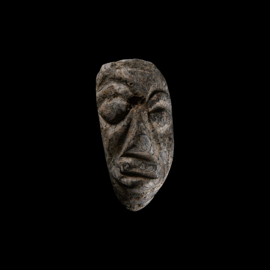 Natural History - Mastodon Fossil Tusk Carving