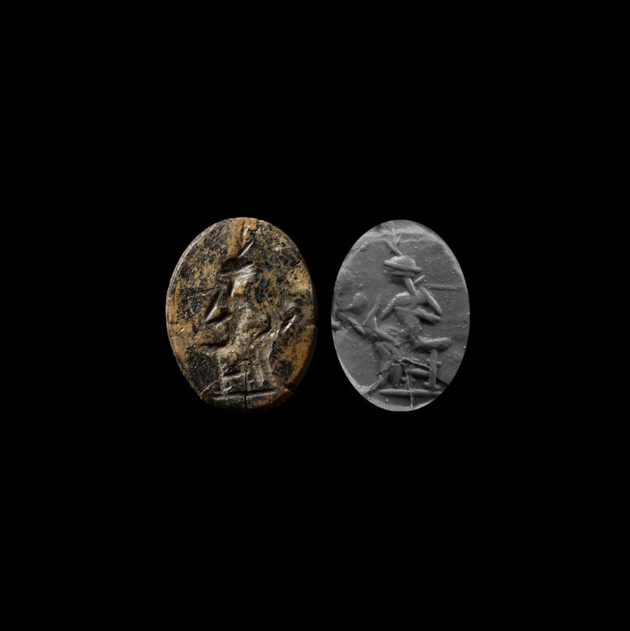 Egyptian Mottled Stone Intaglio with Seated Isis and Horus