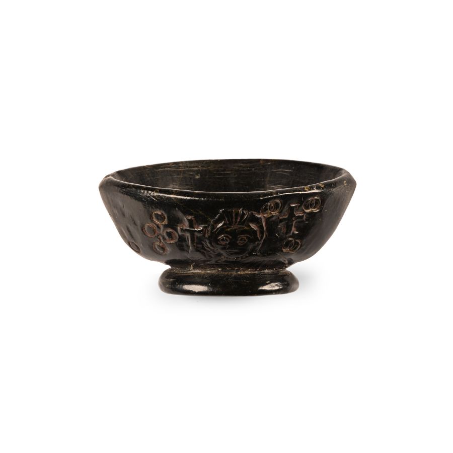 Byzantine Polished Black Stone Dish with Bust of an Emperor