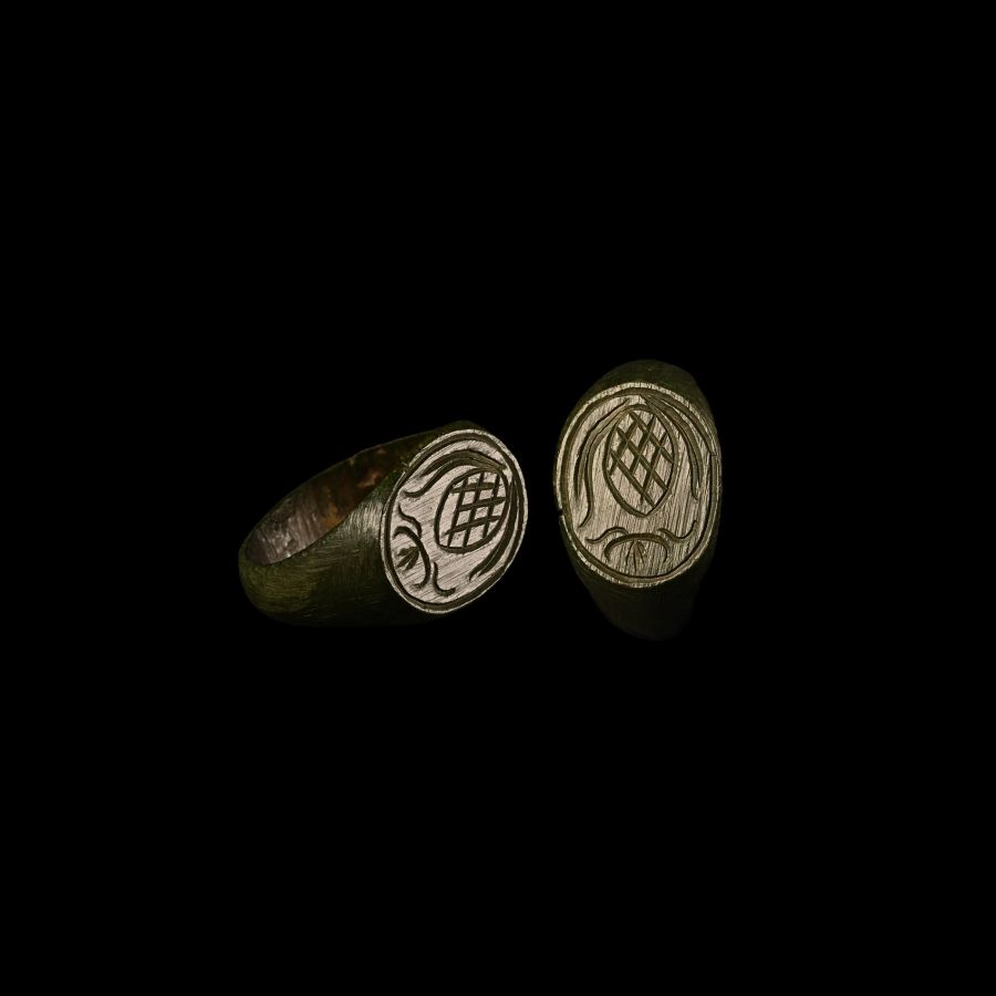 Post Medieval Bronze Ring with Armorial Motif