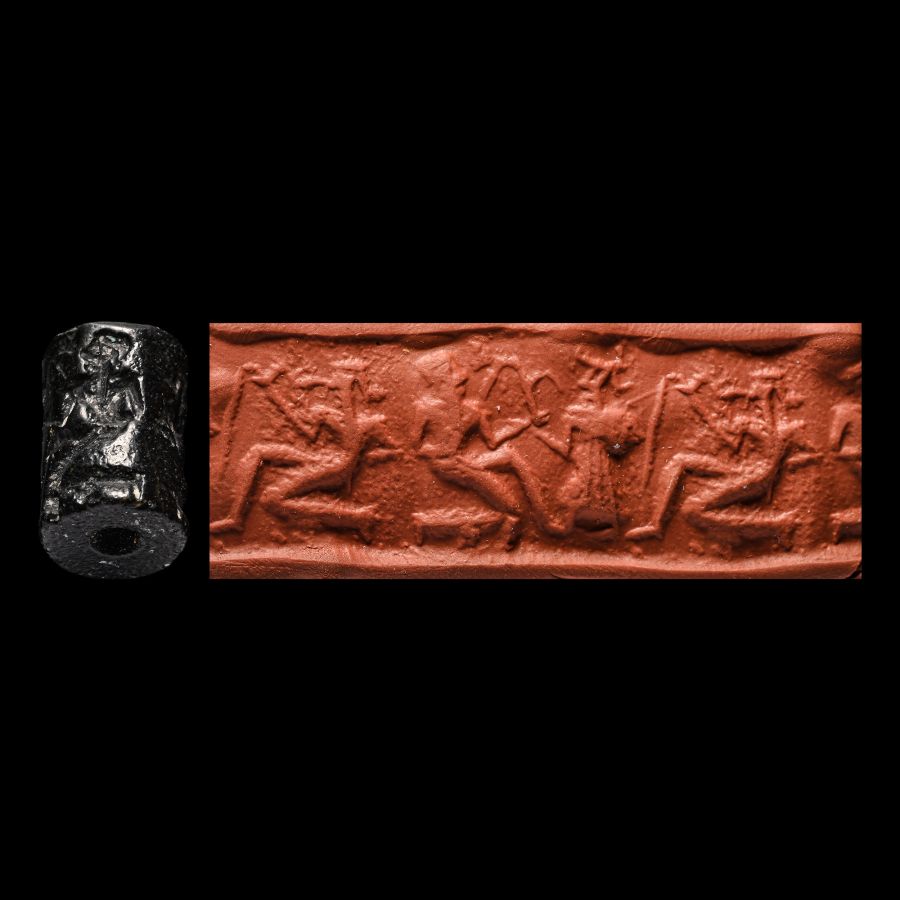 Western Asiatic Black Stone Cylinder Seal with Presentation Scene