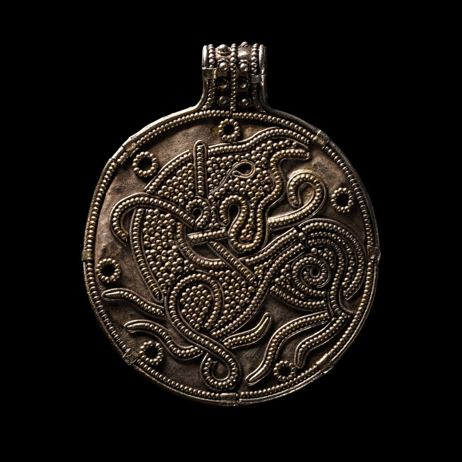 Large Viking Age Silver Pendant with Beast Facing Back