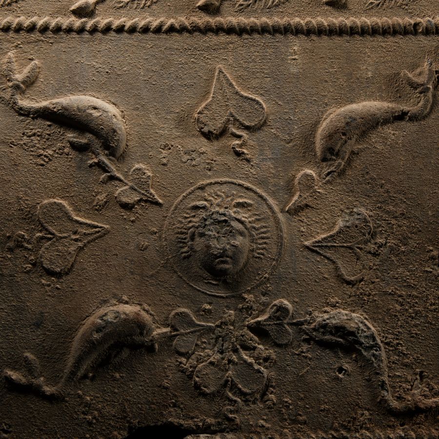 Roman Lead Coffin Fragment with Sphinx, Medusa and Dolphins