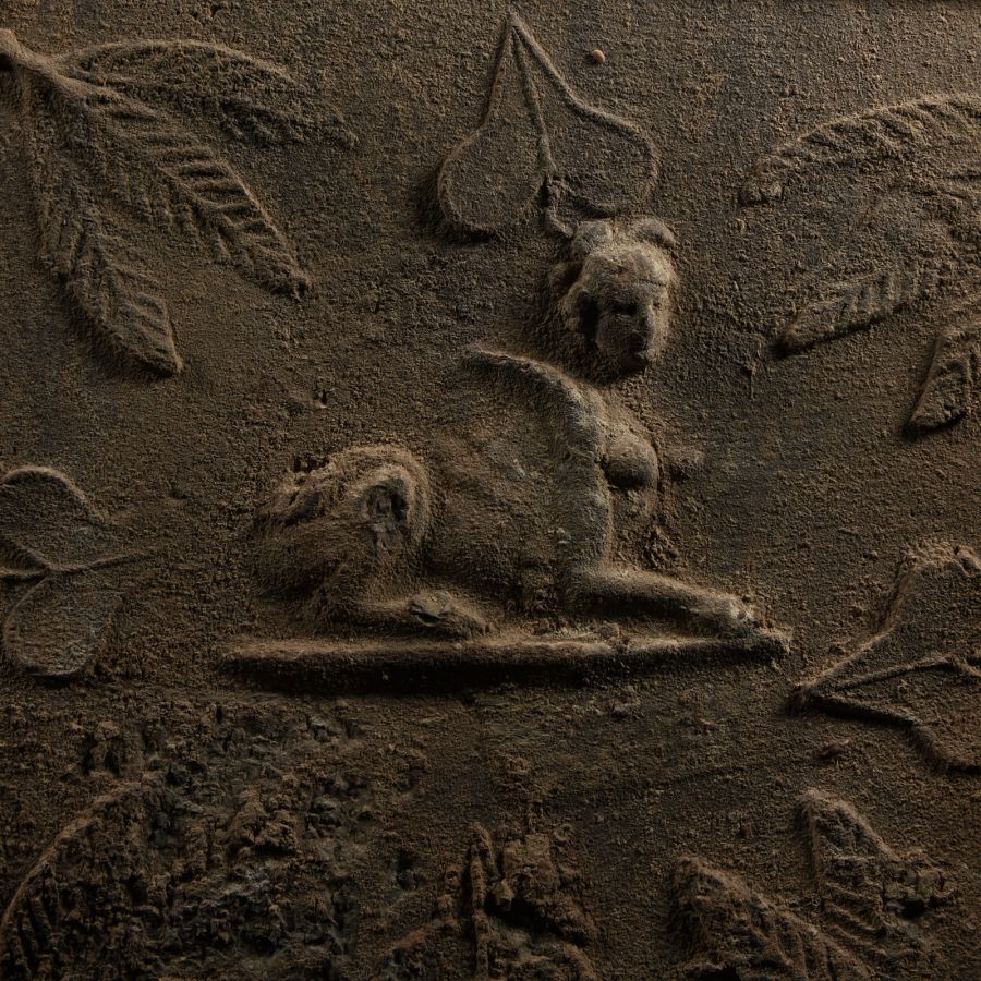 Roman Lead Coffin Fragment with Sphinx, Medusa and Dolphins