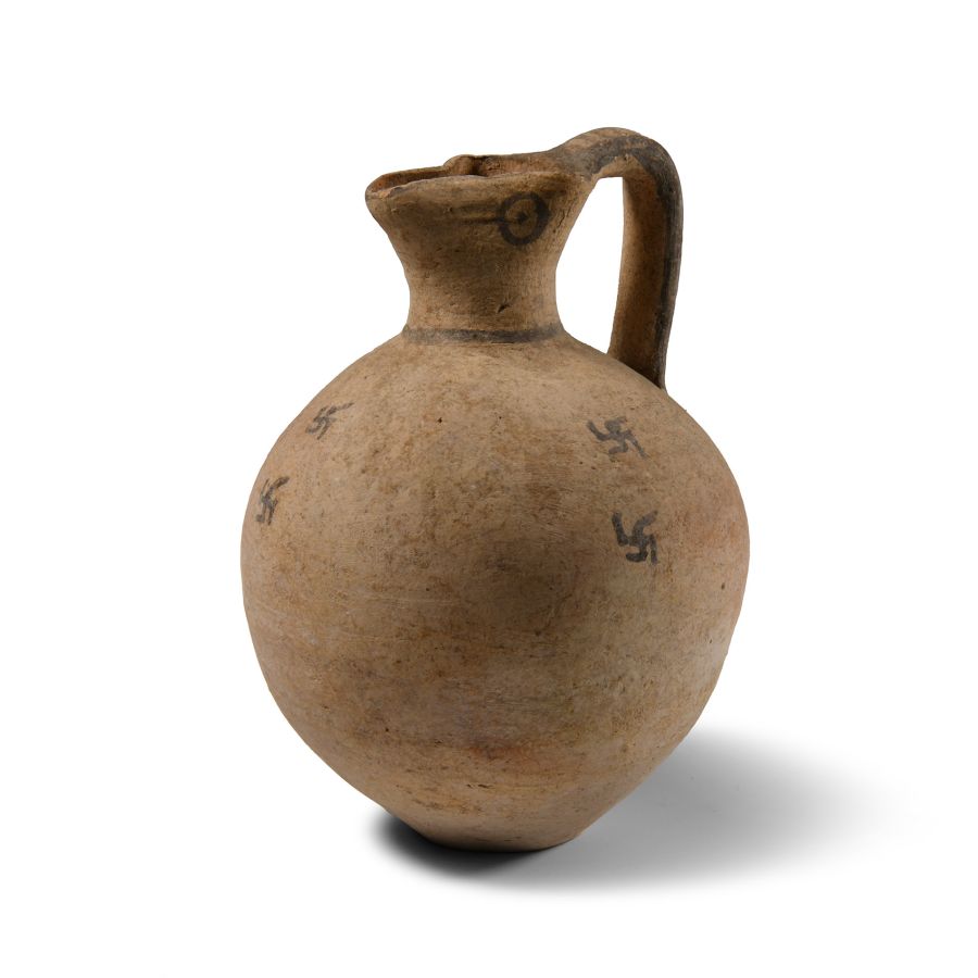 Cypriot 'Eyed' Trefoil Mouthed Pottery Jug with Swastikas