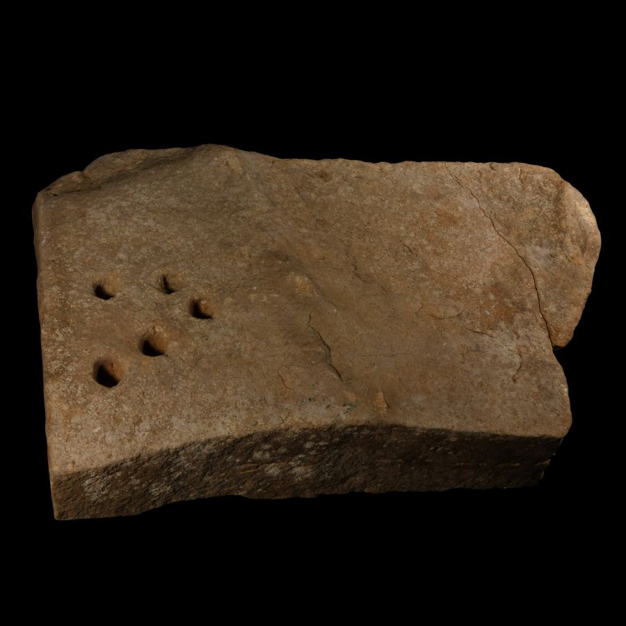 Bronze Age Ritual Limestone Slab with Drillings