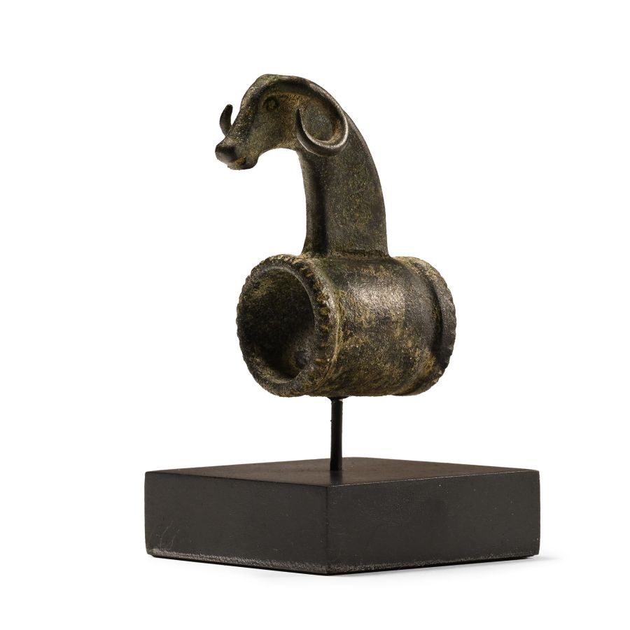 Western Asiatic Bronze Ram's Head Fitting from a Whetstone