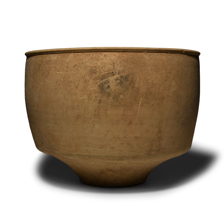 Large Western Asiatic Buff Ware Footed Storage Jar
