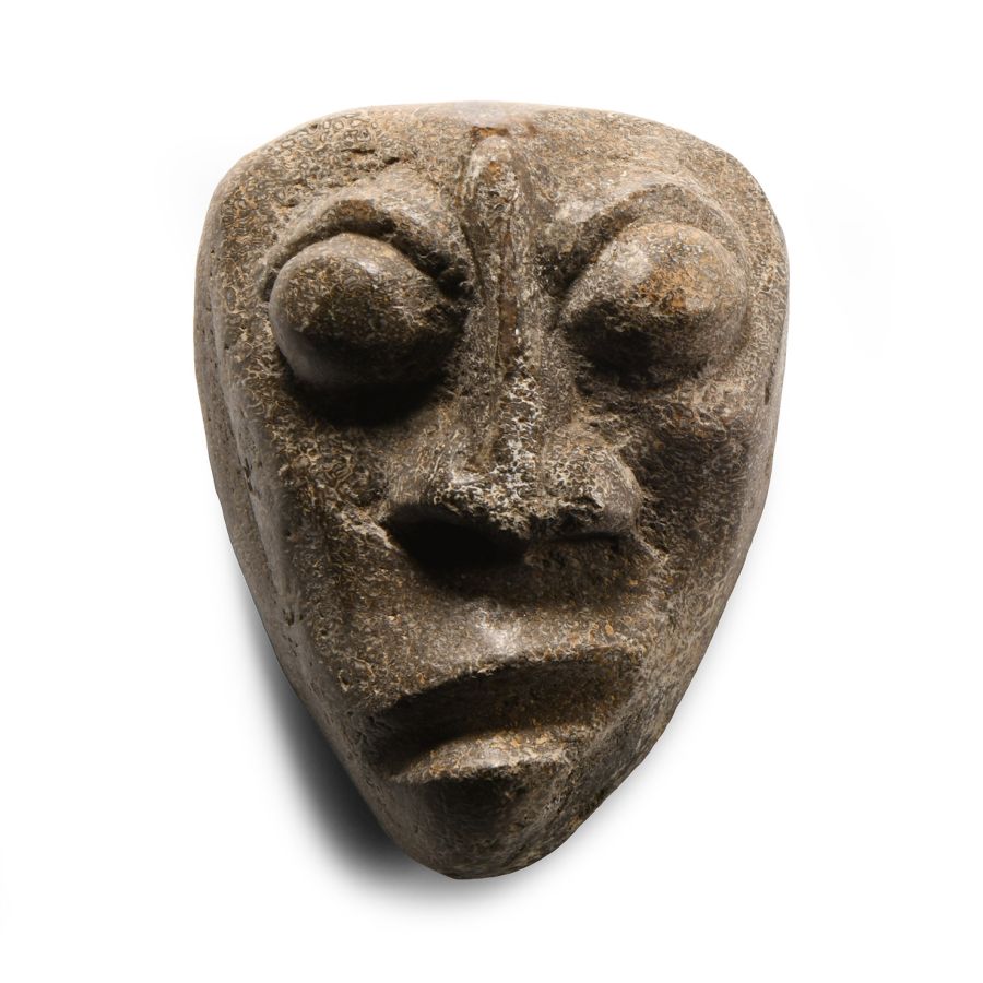 Natural History - Mastodon Bone Face Carving
