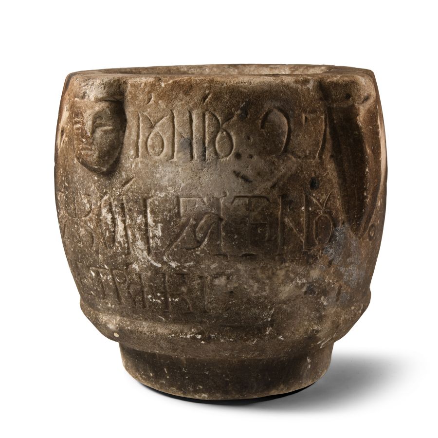 Byzantine Limestone Mortar with Faces and Later Dedication