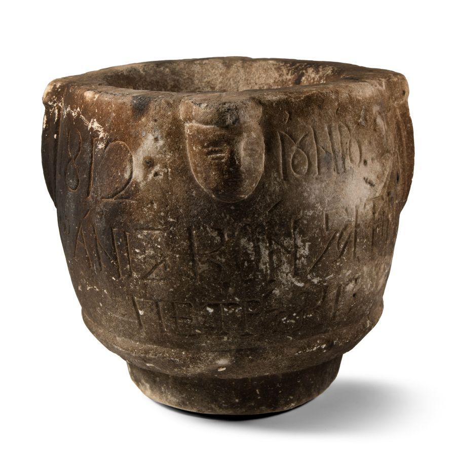 Byzantine Limestone Mortar with Faces and Later Dedication