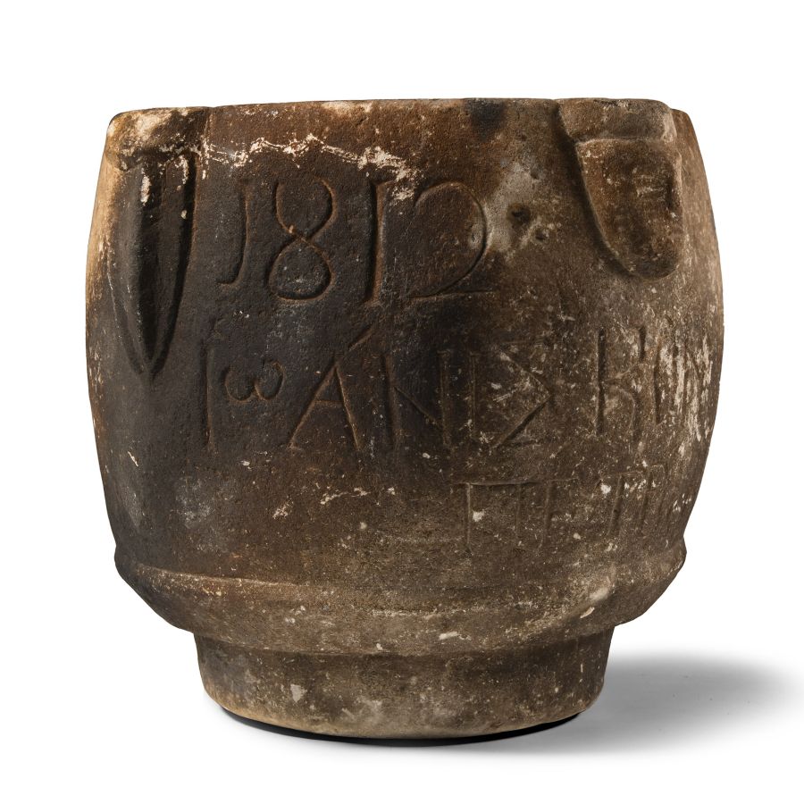 Byzantine Limestone Mortar with Faces and Later Dedication