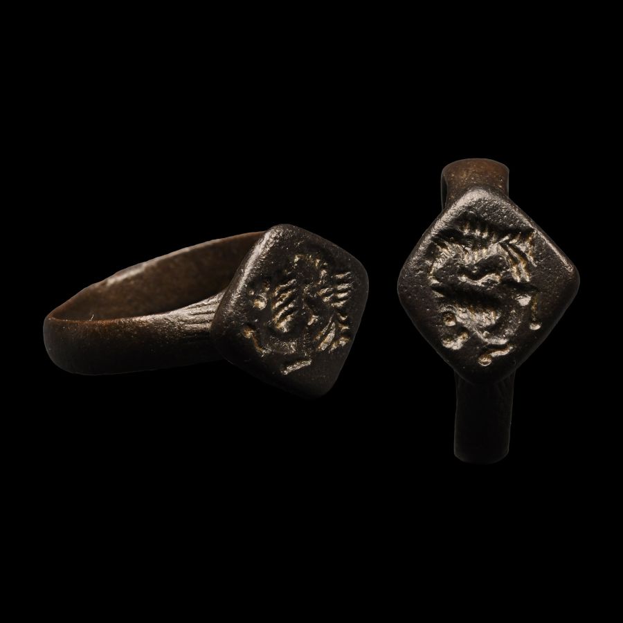 Medieval Bronze Signet Ring with Lion and Prey