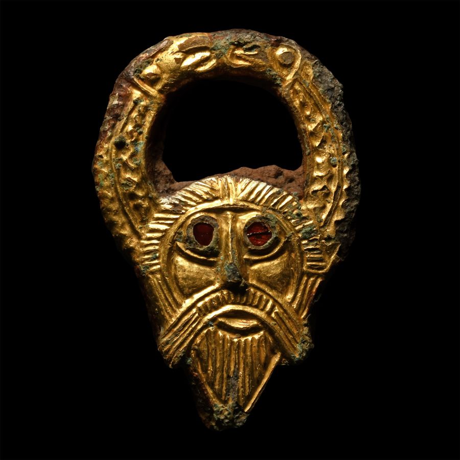 The 'Kingsworthy' Anglo-Saxon Gilt-Bronze Horned Woden's Head Appliqué