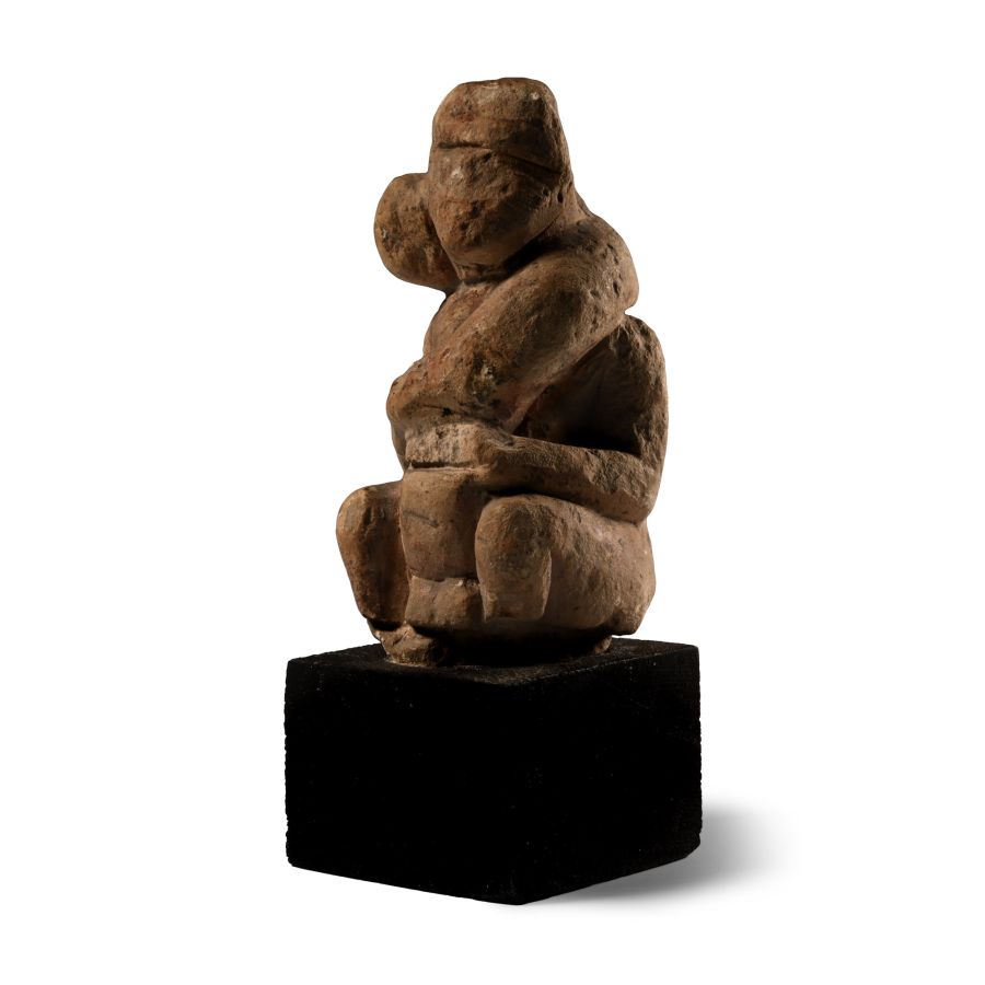 Romano-Egyptian Limestone Figure of a Seated Male with Gigantic Phallus