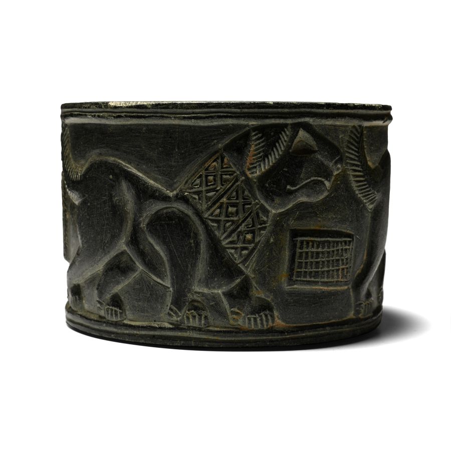 Bactrian Stone Bowl with Two Lions and Female Figure