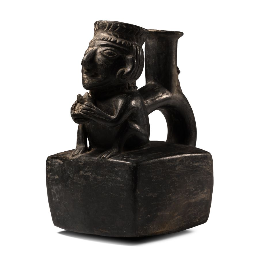 Moche Painted Pottery Stirrup Jar with Crouching Figure