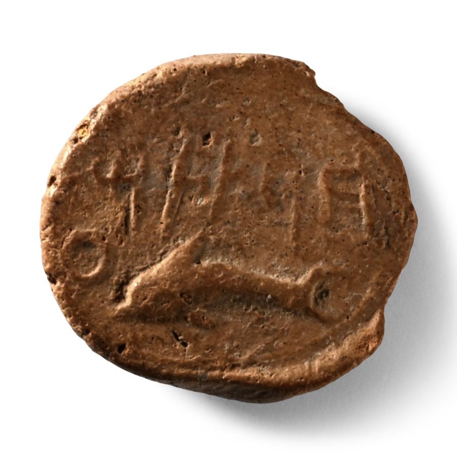 Phoenician Terracotta Bulla with a Dolphin