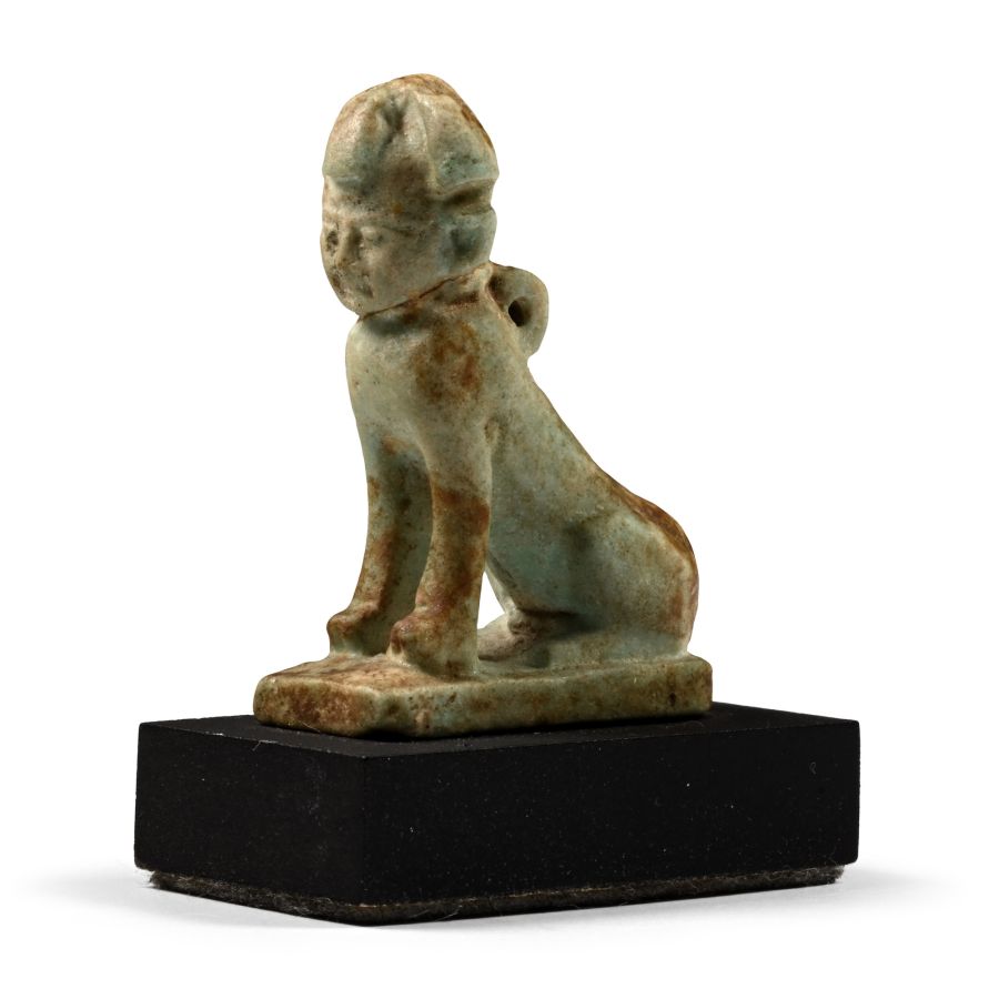Egyptian Green Glazed Faience Amulet of a Seated Sphinx