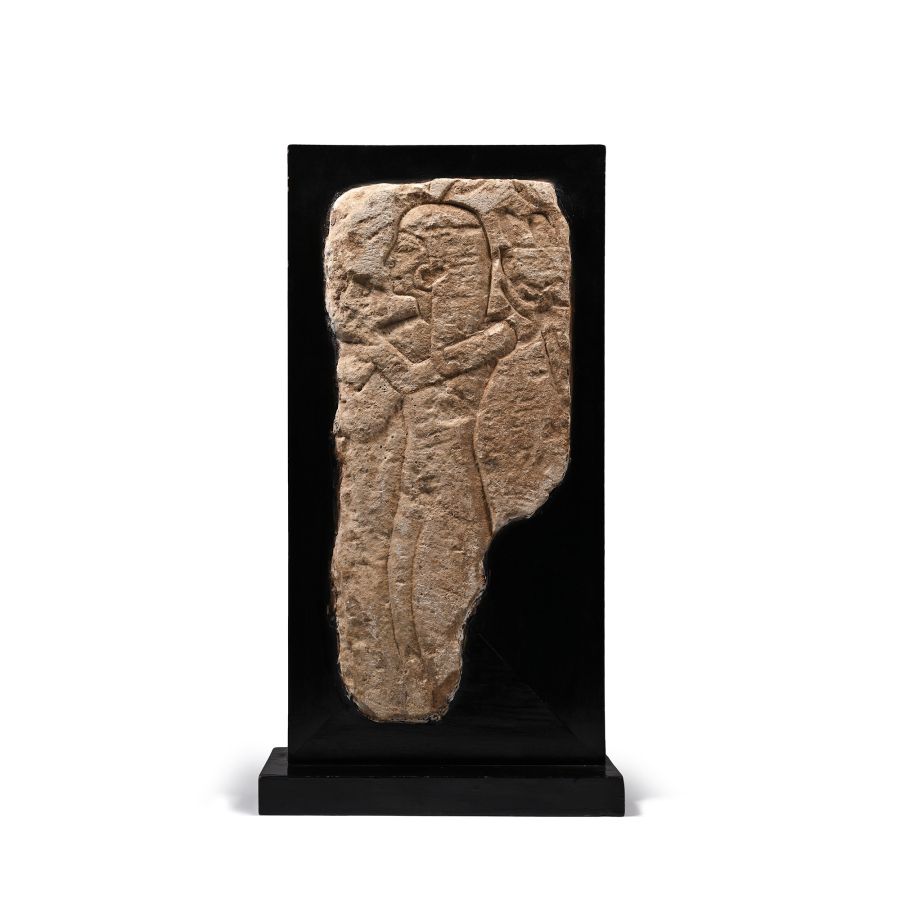 Egyptian Limestone Relief Fragment with Female Figure