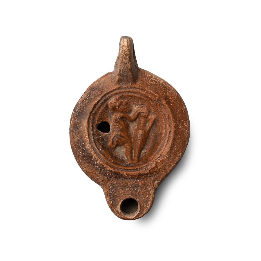 Roman Terracotta Oil Lamp with Slave Holding an Amphora