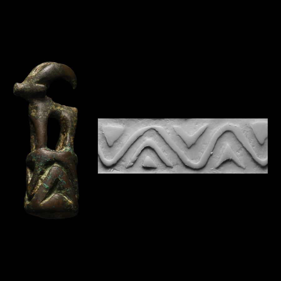 Anatolian Bronze Cylinder Seal Surmounted by Horned Animal