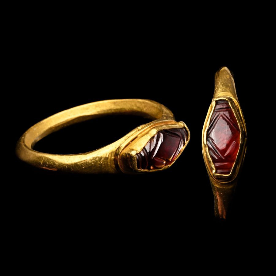 Gold Ring with Elliptical Garnet