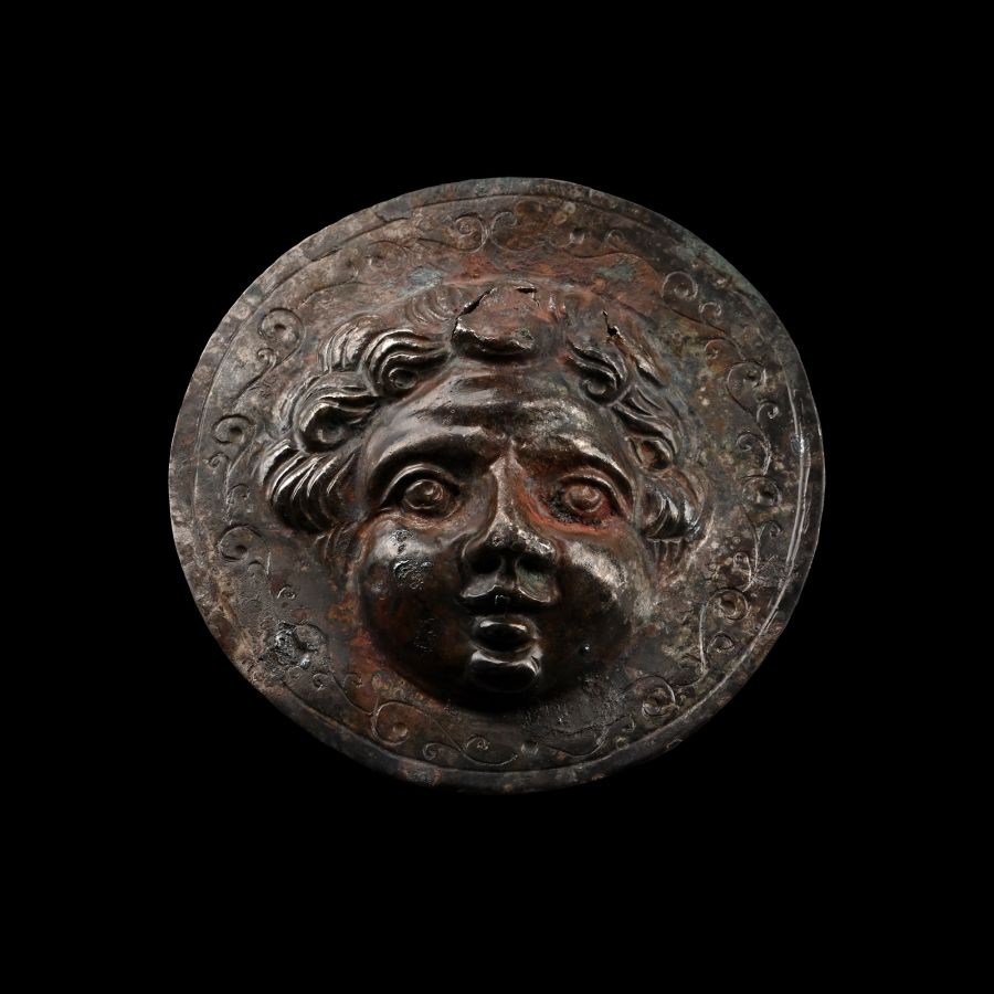 Roman Silver Phalera with Face of Eros, the Greek God of Love