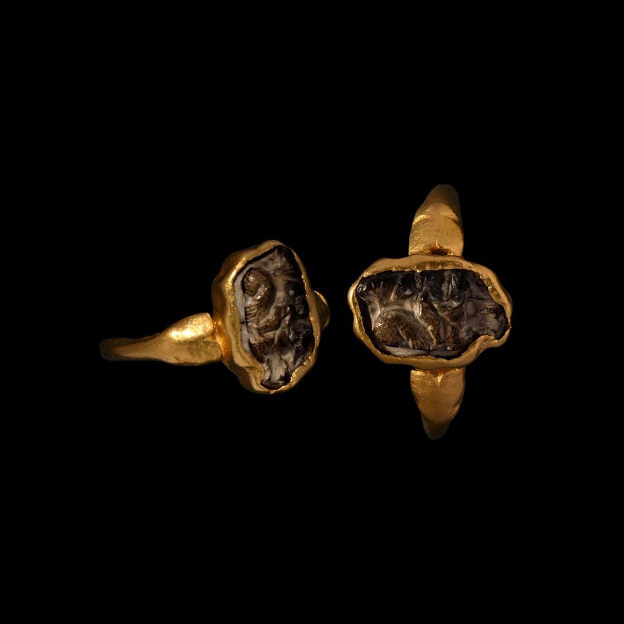 Roman Gold Ring with Burnt Agate Cameo of Eros, the Greek God of Love Riding a Hippocampus